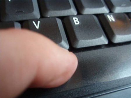 finger on keyboard